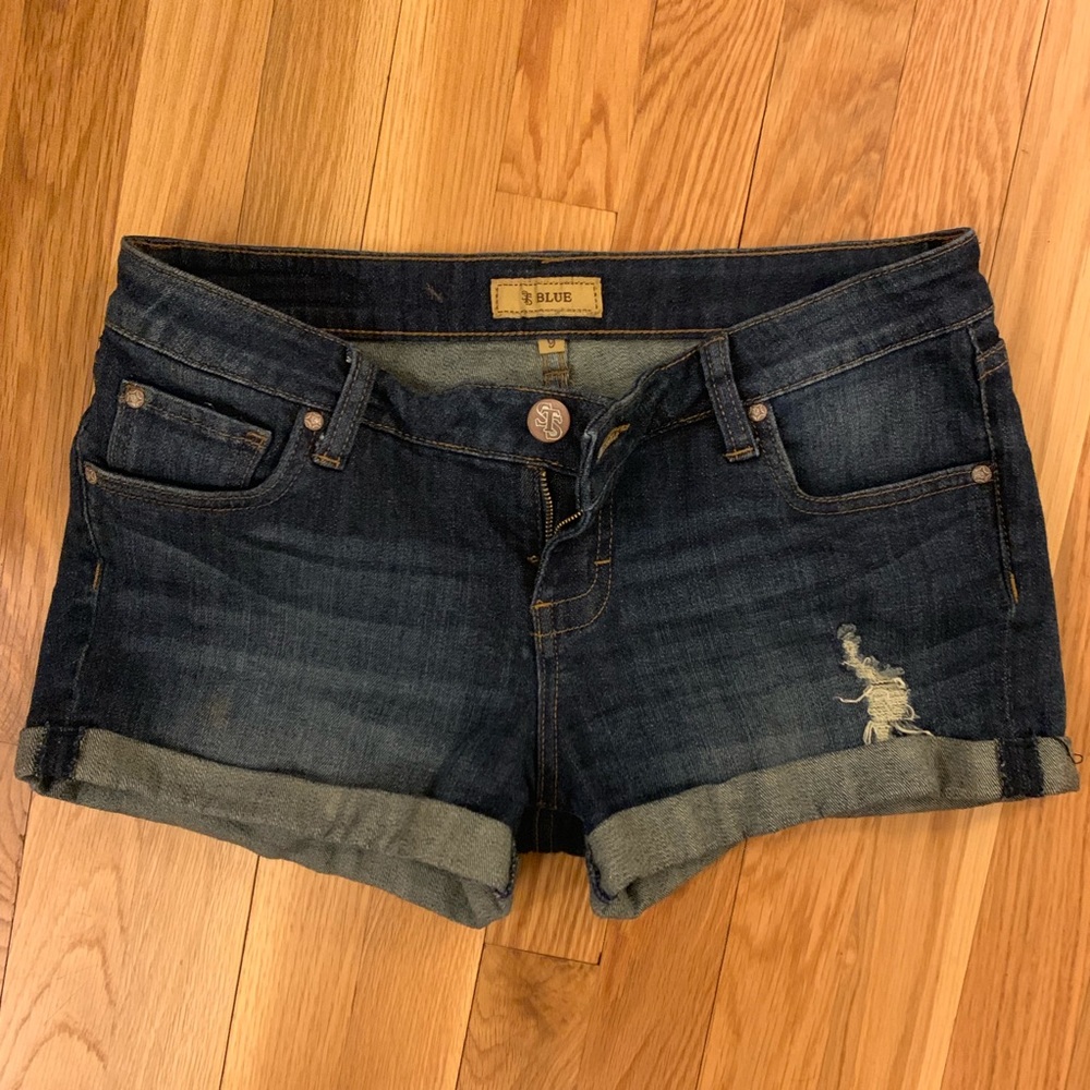 Dark wash distressed denim shorts